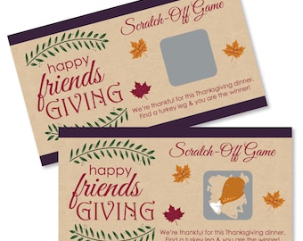 Puede incluir: Dos tarjetas de juego de raspar de cartulina marrón con borde morado. Las tarjetas presentan un diseño de hojas verdes y marrones con el texto "happy friends GIVING" en rojo y blanco. Las tarjetas tienen un área para raspar con el texto "Scratch-Off Game" y el texto "We're thankful for this Thanksgiving dinner. Find a turkey leg & you are the winner!"