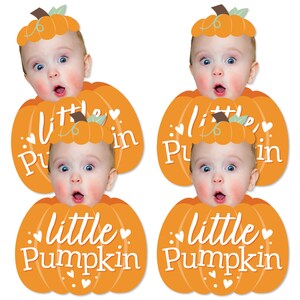 May include: Four orange pumpkin-shaped cutouts with the text "little Pumpkin" in white. Each cutout features a baby's face with a pumpkin hat. The design includes white hearts and green leaves.