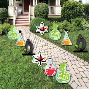 May include: A set of 7 colorful yard signs featuring a microscope, beakers, and an atom. The signs say "Mad Science" in a fun, whimsical font. These signs are perfect for a science-themed party or event.