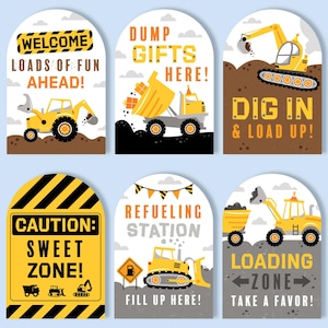 May include: Set of six construction-themed party signs. Each sign features a yellow and black color scheme with illustrations of construction vehicles like excavators and dump trucks. Text includes phrases like "Welcome," "Dump Gifts Here," and "Loading Zone."