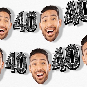 May include: A banner featuring the number "40" in black glitter with a white outline, strung between smiling faces. The faces are of a man with dark hair and a beard, with an excited expression.
