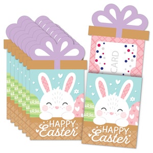 May include: A set of 10 Easter gift card holders featuring a cute bunny rabbit design. Each holder is decorated with pastel colors, hearts, and eggs. The front of the holder says "Happy Easter".