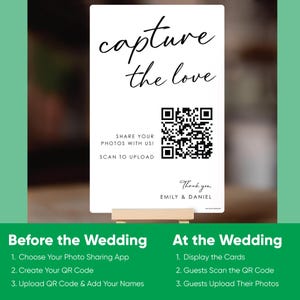 May include: A white rectangular sign with black text that reads capture the love, share your photos with us! scan to upload, thank you, and EMILY & DANIEL. The sign features a central black and white QR code and rests on a small wooden stand.