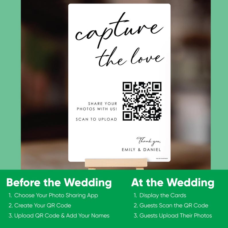 May include: A white rectangular sign with black text that reads capture the love, share your photos with us! scan to upload, thank you, and EMILY & DANIEL. The sign features a central black and white QR code and rests on a small wooden stand.