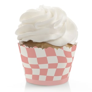 May include: Pink and white checkered cupcake liner with a swirl of white frosting on top.
