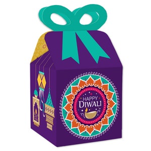 May include: Purple favor boxes with a teal bow and a mandala design. The boxes feature the text "Happy Diwali" and a diya.