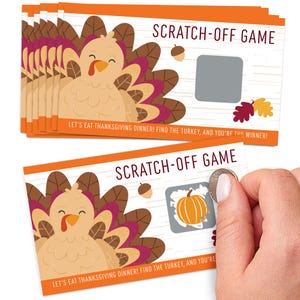 May include: Thanksgiving-themed scratch-off game cards. Each card features a cartoon turkey, acorns, and fall leaves. The text on the cards reads "SCRATCH-OFF GAME" and "LET'S EAT THANKSGIVING DINNER! FIND THE TURKEY, AND YOU'RE THE WINNER!"