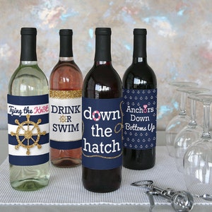 May include: Four wine bottles with nautical themed labels. The labels read "Tying the Knot", "Drink or Swim", "Down the Hatch", and "Anchors Down Bottoms Up".