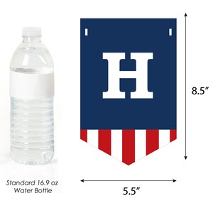 May include: A blue and red pennant banner with the letter "H" in white. The banner is 8.5 inches tall and 5.5 inches wide.