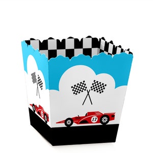 May include: A blue and white checkered popcorn box with a red race car and checkered flags. The box has a scalloped edge and says "17" on the car.