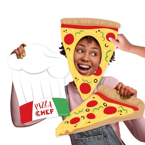 May include: Two pizza-themed photo booth props. One is a white chef's hat with a red and green pizza chef logo that says "Pizza Chef". The other is a yellow pizza slice with red pepperoni, green peppers, and a hole for a face.