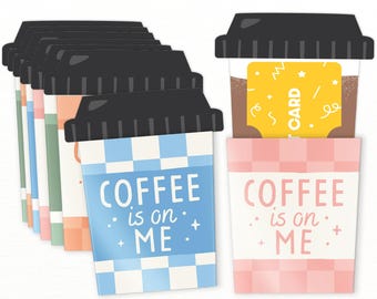 May include: A stack of coffee-themed gift card holders with black lids. One holder is blue and white checkered with the text "COFFEE is on ME." Another is pink and white checkered with the same text. A yellow gift card is visible.