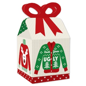 May include: Red and green Christmas gift boxes with a white knit pattern and a red bow. The boxes feature a green sweater with the text "Rock Your Ugly".