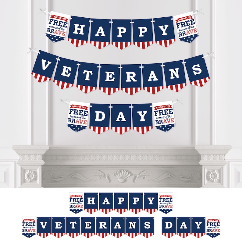 May include: A red, white, and blue banner with the words "Happy Veterans Day" and "Land of the Free because of the Brave" on each flag. The banner is perfect for decorating for Veterans Day.