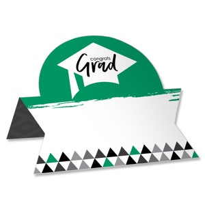 May include: Green, black, and gray graduation table place card with a white graduation cap and the text "Congrats Grad".