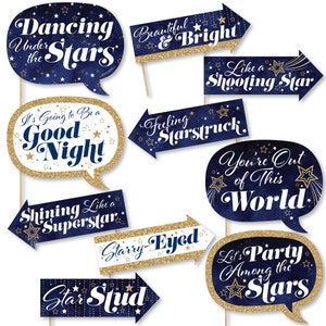 May include: A set of 10 blue and gold star-themed photo booth props with sayings like "Dancing Under the Stars", "It's Going to Be a Good Night", "Shining Like a Superstar", "Starry-Eyed", "Star Stud", "Beautiful & Bright", "Like a Shooting Star", "Feeling Starstruck", "You're Out of This World", and "Let's Party Among the Stars".