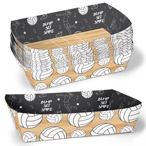 May include: A stack of black and white paper food trays with a volleyball theme. The trays feature a volleyball court, volleyballs, and the text "Bump Set Spike".