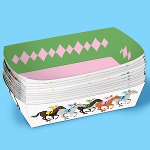 May include: A stack of white paper food trays. The top edge has a green and pink diamond pattern. The bottom edge features a graphic of racehorses with jockeys in various colours, set against a light blue background.