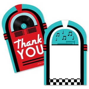 May include: Two red and blue vintage jukebox shaped thank you cards. The first card has the words "Thank You" on the front. The second card has a blank space for writing a message.