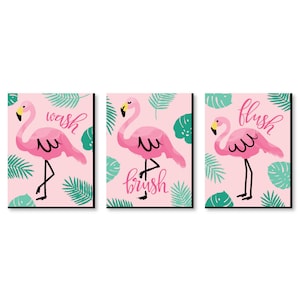 May include: Three pink flamingo bathroom signs with green tropical leaves. The signs say "wash", "brush", and "flush".