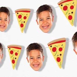 May include: A decorative party banner featuring alternating cutouts of a smiling child's face and triangular slices of pepperoni pizza. The pizza slices are yellow with red pepperoni circles and brown crusts, all strung together on a thin white cord.