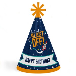 May include: A blue and orange party hat with a rocket ship design and the text "3...2...1... BLAST OFF!" and "HAPPY BIRTHDAY".