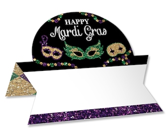 May include: Black and gold Mardi Gras themed place card with a gold and purple glitter border. The card has a black circle with the text "Happy Mardi Gras" and three gold and green glitter masks.