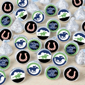 May include: Assortment of round, colorful stickers with horse racing themes. Stickers feature horseshoes, horses, and the text "Down and Derby".