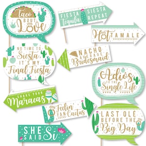 May include: A set of 10 green, white, and gold photo booth props with cactus and fiesta themed text. The props include phrases like "Taco Bout Love", "Siesta, It's My Final Fiesta", "Nacho Average Bridesmaid", and "Last Ole Before The Big Day".