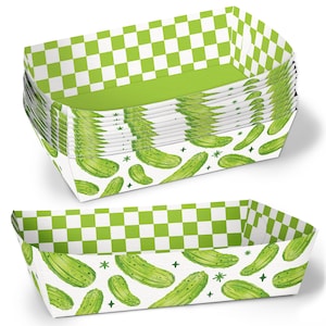 May include: A stack of rectangular paper food trays with a green and white checkered pattern on the top and a pickle design on the sides. The trays are white with a green interior.
