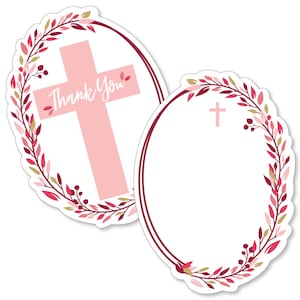 May include: Two oval-shaped thank you tags with a pink cross and floral wreath design. The first tag says "Thank You" and the second tag is blank.