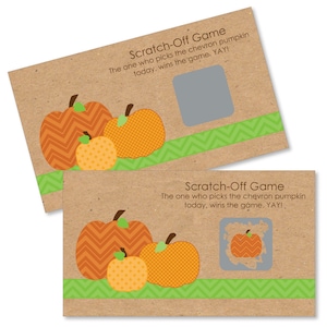 May include: Two brown cards with a scratch-off game featuring a chevron pumpkin design. The text on the cards reads "Scratch-Off Game. The one who picks the chevron pumpkin today, wins the game. YAY!"