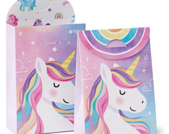 May include: Two unicorn-themed gift bags. The bags feature a white unicorn with a rainbow mane and a golden horn against a pastel background of pink, purple, and blue. The bags have a rainbow and star design.