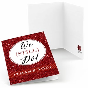 May include: Red and white thank you card with a chevron pattern and the text "We {STILL} Do!" in a circle. The card also has the text "Thank You" and "40 Years" in black.