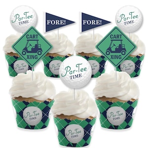 May include: Golf-themed cupcake toppers with green and blue accents. The toppers feature golf balls, golf carts, and the text "Par-Tee Time" and "FORE!"