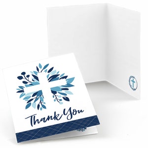 May include: A white thank you card with a blue and white floral wreath design featuring a white cross in the center. The card has a blue and white plaid pattern at the bottom and the words "Thank You" in a white cursive font.