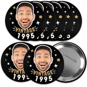 May include: A set of 10 black and gold round buttons with a photo of a person's face and the text "Vintage 1995".