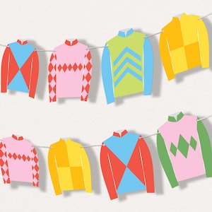 May include: A string of colorful jockey silks, each with unique geometric patterns and color combinations. The silks are in shades of red, blue, yellow, green, and pink, strung on a thin white line against a white background.