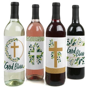 May include: Four wine bottles with labels featuring a gold cross and green leaves. The labels also include the text "God Bless".