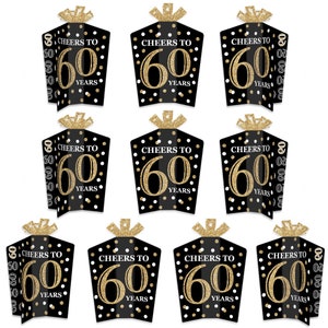 May include: Ten black and gold table decorations with white polka dots. Each decoration features the text "Cheers to 60 Years".