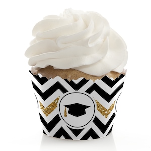 May include: Black and white chevron cupcake wrappers with a gold glitter graduation cap design. The wrappers are perfect for a graduation party.