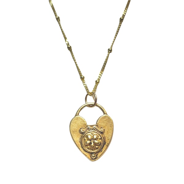 Antique English Victorian heart with keyhole on back