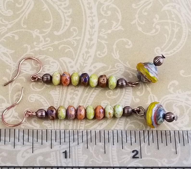 NE275 Beautiful Faceted Czech Beads in Colors of Browns Greens and Blues Highlight this Pair of Copper Dangle Drop Earrings