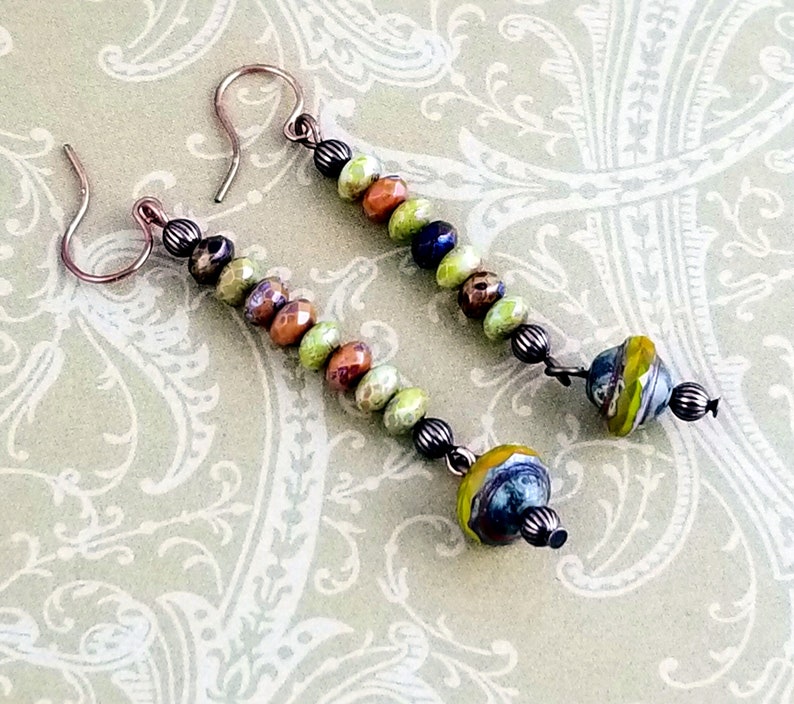 NE275 Beautiful Faceted Czech Beads in Colors of Browns Greens and Blues Highlight this Pair of Copper Dangle Drop Earrings