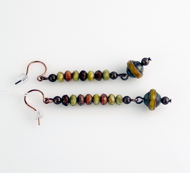 NE275 Beautiful Faceted Czech Beads in Colors of Browns Greens and Blues Highlight this Pair of Copper Dangle Drop Earrings
