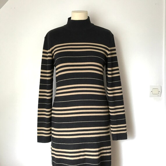 Robe le petit baigneur sale
