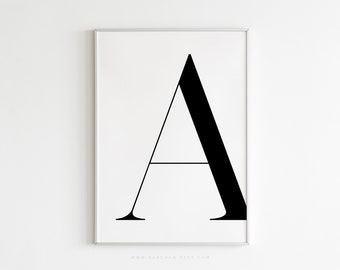 May include: A black and white printable art print featuring the letter "A" in a bold, sans-serif font. The letter is centered on a white background.