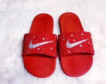 nike slippers with gold check