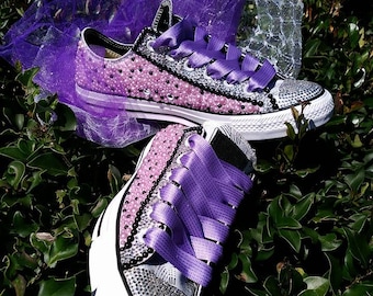 white eyelet converse sneakers