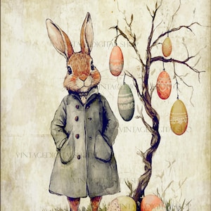 May include: A watercolor illustration of a rabbit wearing a coat standing next to a tree with Easter eggs hanging from its branches. The eggs are decorated with different patterns and colors.